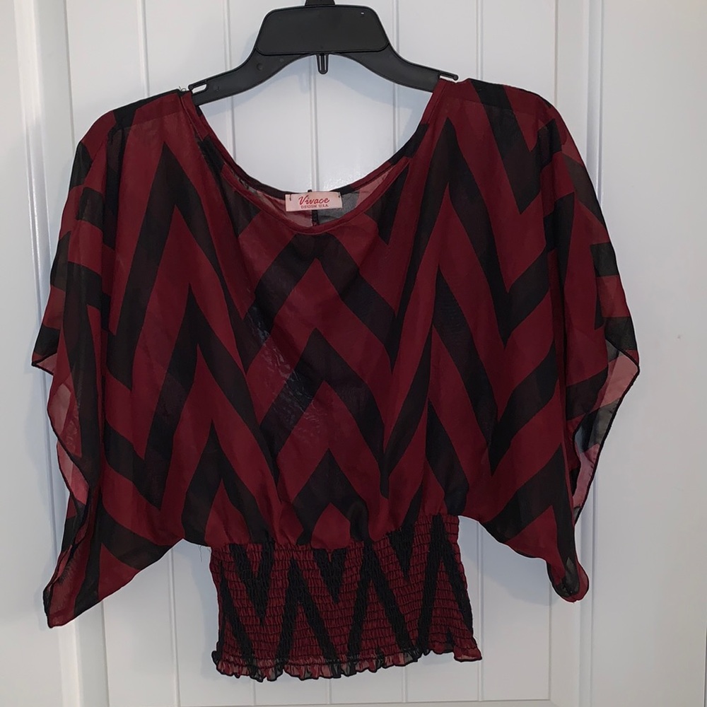 Super cute waist flattering sheer shirt!